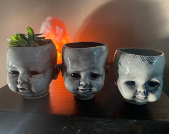 Larger baby head planter