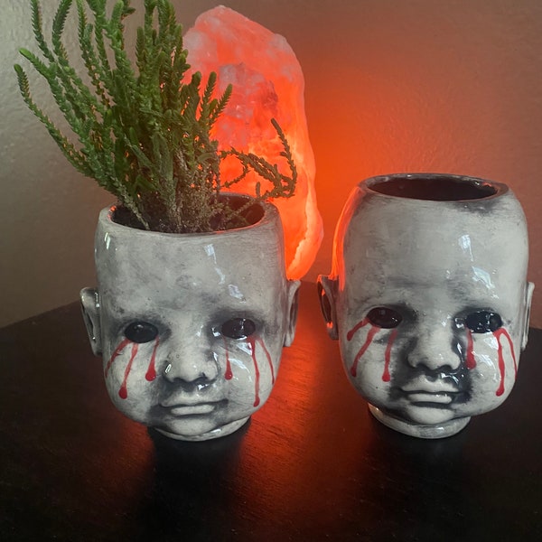 Larger tears baby head planter