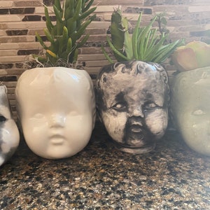 baby doll head  planter
