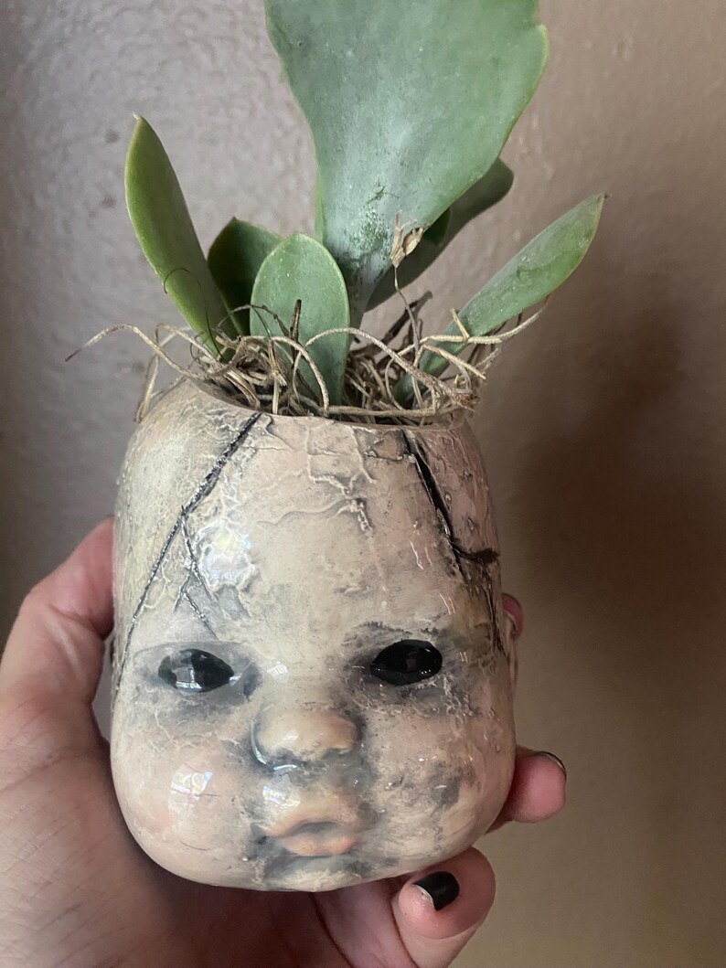 Zombie baby head planteringskärl bild 8