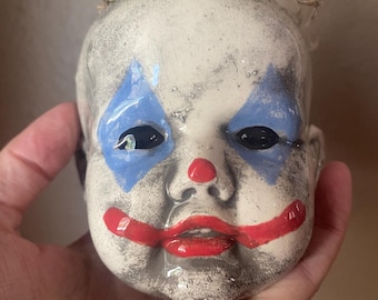 Clown baby head flower pot