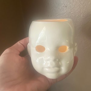 Spooky Baby head candle holder
