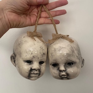 Creepy doll head 4 inch holiday ornament