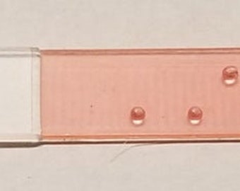 Custom Braille strips for existing signs