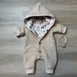 Pasgeboren overall van wollen fleece 50-68