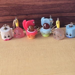 Humorous stitch marker set from reclaimed toys
