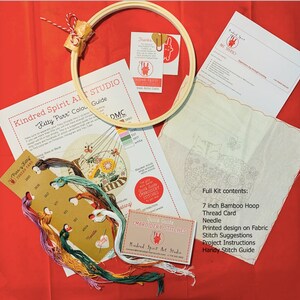 May include: A complete embroidery kit featuring a cat design. The kit includes a 7-inch bamboo hoop, thread card, needle, printed fabric, stitch suggestions, project instructions, and a handy stitch guide.