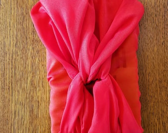 Earth-friendly SCARF LOVERS GIFT: Love Earth Now book wrapped in sheer red scarf, furoshiki-style