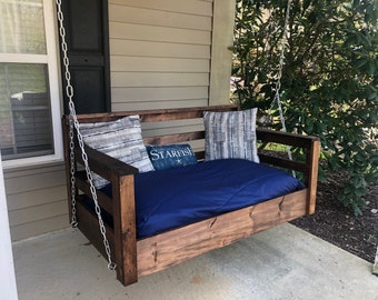 swinging crib bedding