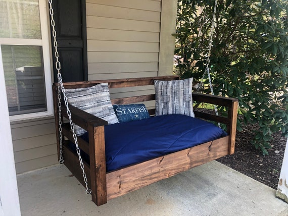 swinging crib mattress