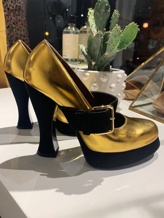 iconic gold heels