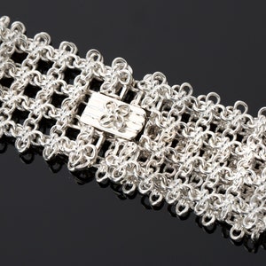 Handcrafted Sterling Silver Bracelet: Exclusive Korean Knot Motif Metal silver art work by NASCHENKA