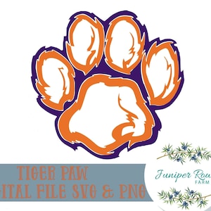 Pode incluir: Um gráfico digital de uma pegada de pata de tigre com um centro branco, contornos laranja e uma camada de fundo roxa. O texto TIGER PAW DIGITAL FILE SVG & PNG aparece em laranja e um logótipo circular da Juniper Row Farm é visível.
