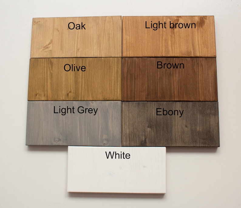 May include: Wood stain color samples in shades of oak, light brown, olive, brown, light grey, ebony, and white.