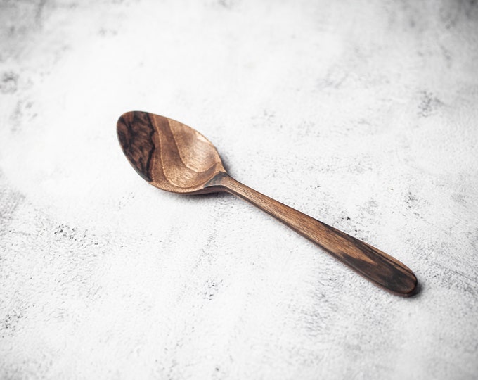 Wooden eating spoon. Walnut wood serving spoon hand carved. Cooking utensil, wooden kitchenware, cutlery. Unique natural gift