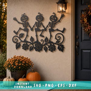 May include: A black metal wall art piece featuring three dancing skeletons with pumpkin heads, connected by a decorative vine with leaves and flowers. The design is displayed on a beige wall, with text at the bottom reading INSTANT DOWNLOAD SVG PNG EPS DXF.