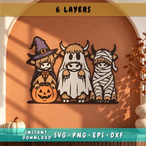 May include: A digital graphic design featuring three Highland cows in Halloween costumes: one wearing a purple witch hat behind an orange jack-o'-lantern, one dressed as a white ghost, and one wrapped in white mummy bandages. Text reads 6 LAYERS.