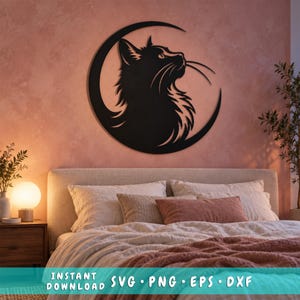 May include: A black wall art piece featuring a silhouette of a cat head positioned within a crescent moon shape. The design includes long whiskers and detailed fur textures. The text at the bottom reads: INSTANT DOWNLOAD SVG PNG EPS DXF.