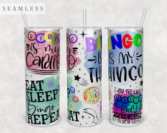 May include: Three stainless steel tumblers with colourful designs and text. The tumblers feature the words "Bingo is my Cardio", "Bingo is my Thingo", and "I am the Crazy Bingo Lady You've Heard So Much About".