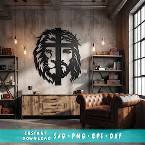 May include: A black metal wall art piece featuring a split design of a lion's face on the left and a face wearing a crown of thorns on the right, bisected by a vertical cross. The text at the bottom reads: INSTANT DOWNLOAD SVG PNG EPS DXF.