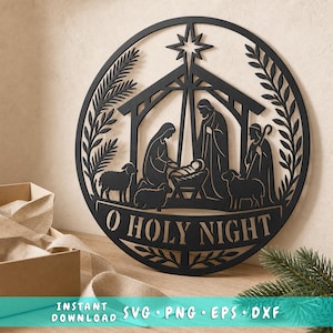 Puede incluir: Una pieza de arte mural circular negra que presenta una escena de natividad cortada con láser con figuras de María, José y el niño Jesús en un pesebre, rodeados de ovejas y follaje. El texto O HOLY NIGHT está centrado en la parte inferior.