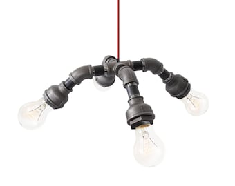 May include: A four-light industrial style pendant light fixture made from black metal pipes. The fixture has a red cord and is suspended from the ceiling. The light bulbs are exposed and have a clear glass finish.
