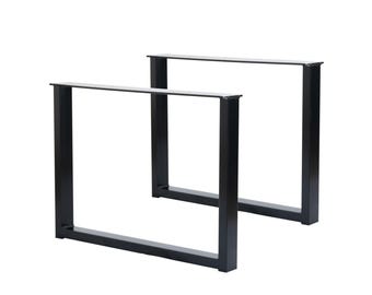 Könnte beinhalten: Zwei schwarze Tischbeine aus Metall, jedes mit einem rechteckigen Rahmen. Die Beine sind aus robustem Metall gefertigt und haben ein schlichtes, modernes Design.