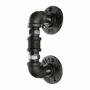 May include: Black metal pipe door handle with two flanges. The flanges are marked with the numbers "1/2" and "1/4".
