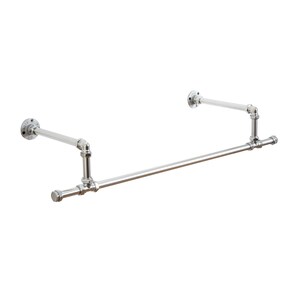 May include: A silver industrial pipe style clothing rack with two arms extending from the wall and a center bar for hanging clothes.
