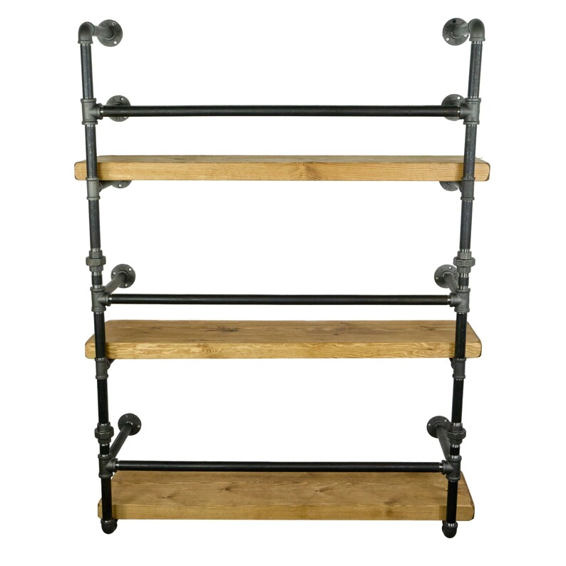May include: Three-tiered industrial-style shelf unit with black metal pipes and wooden shelves.