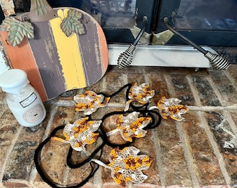 Herfstbladerenslinger