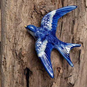 Ceramic swallow. The return of spring...