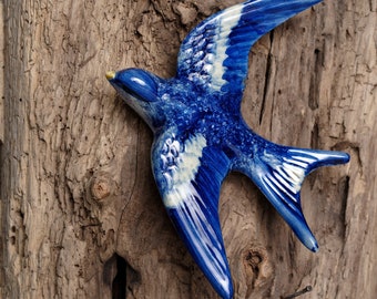 Ceramic swallow. The return of spring...