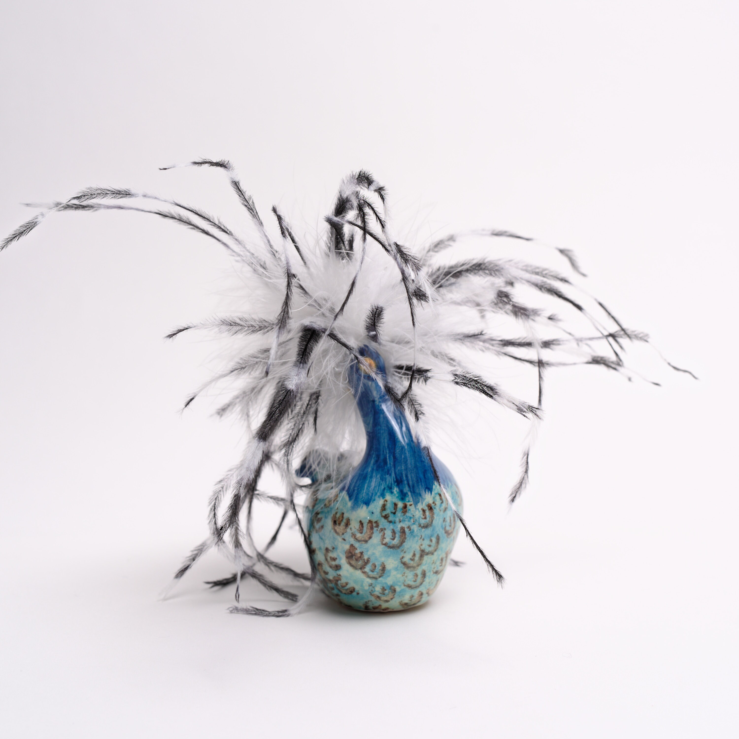 Poule Plumes en Céramique