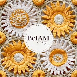 May include: Crocheted sunflower design with white and yellow petals, and a white center. The design is set on a crocheted background. The image includes the text "BeIAM design" in a white circle.