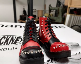 Handmade cockney footwear, two tone, black and red leather, 6' eyelets, hand stitched boots with studs. Steel toe caps