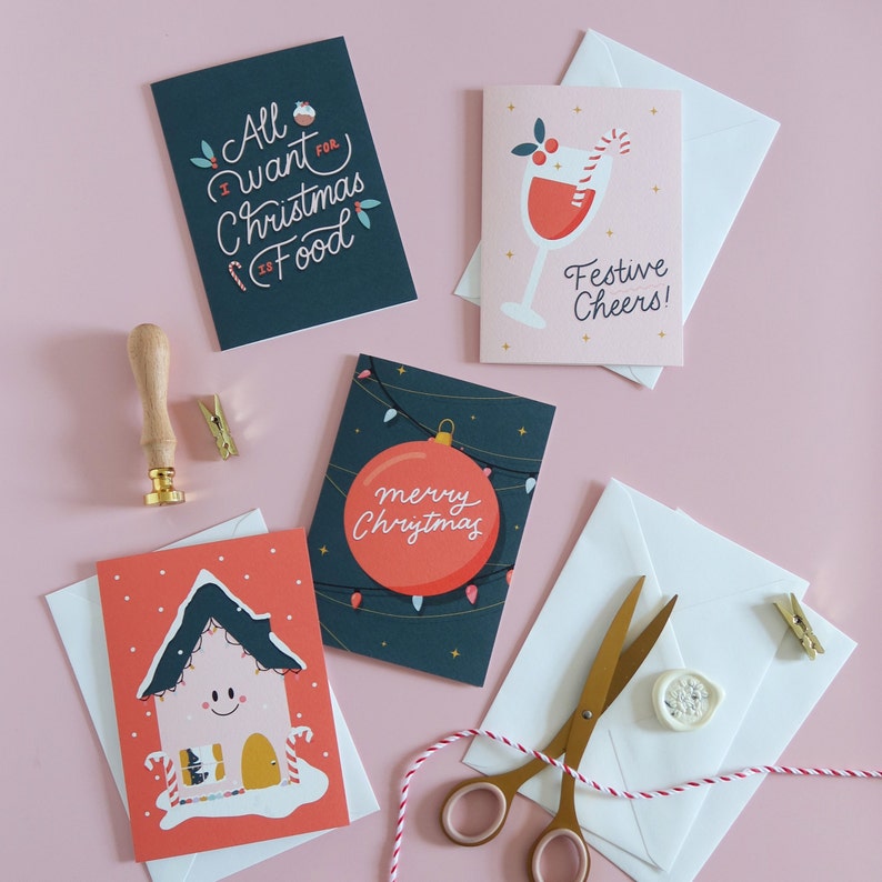 Christmas card pack, 4 designs including: Merry Christmas Bauble, All I Want For Christmas Is Food, Festive Cheers, Christmas House Design. image 6