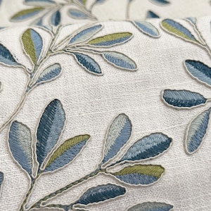 Designer fabric blue - green floral embroidery | Fabric swatch