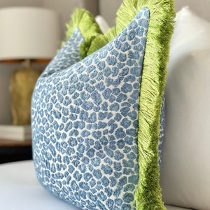 Decorative Blue cheetah spotted throw pillow cover, blue cheetah cushion with green brush fringe detail, cheetah accent pillow