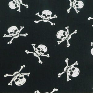 May include: Black fabric with a repeating pattern of white skull and crossbones.