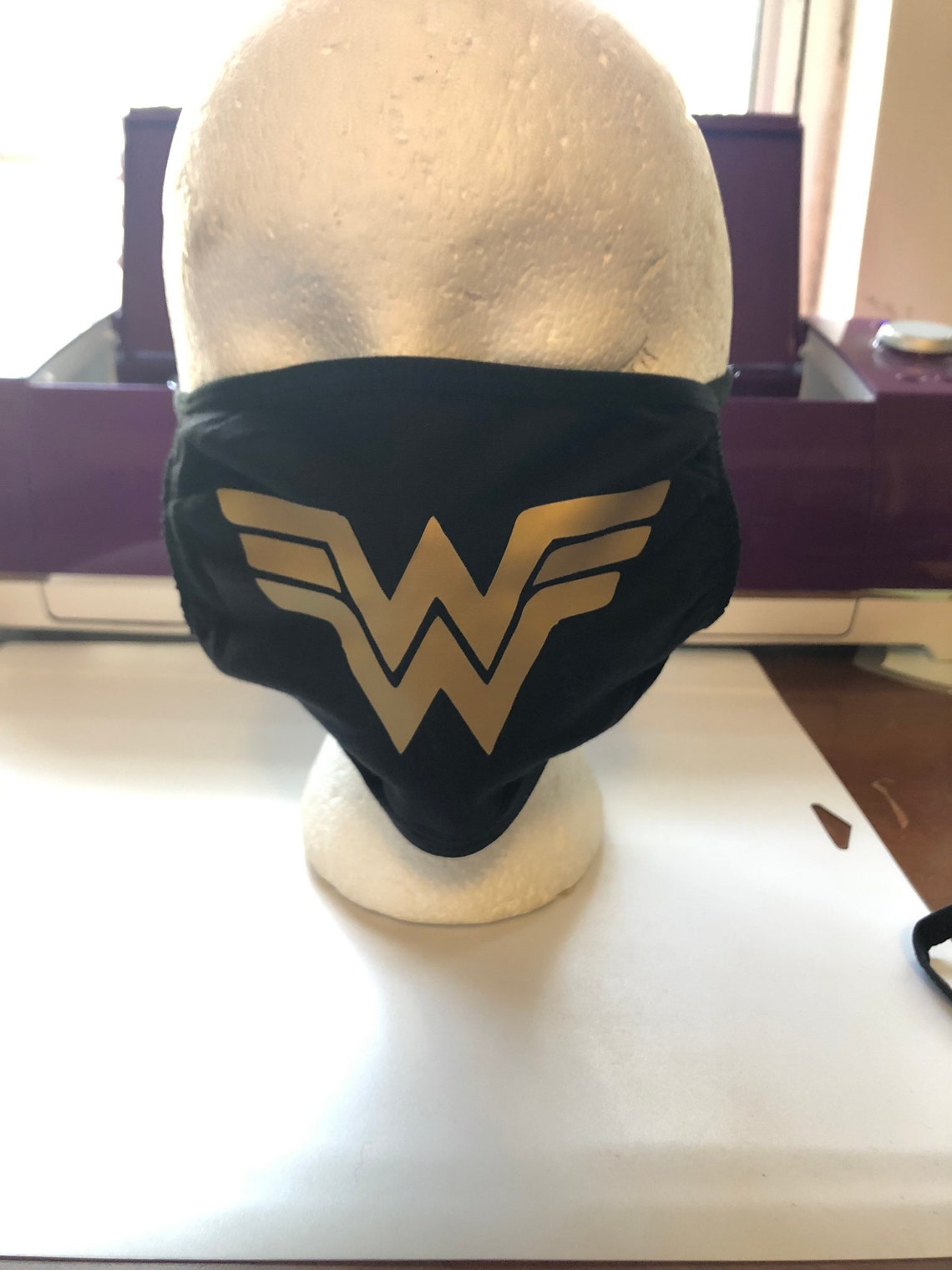 Wonder Woman logo face mask. Etsy