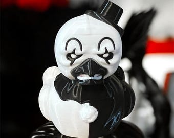 Pato de plástico impreso en 3D con la imagen de Art el Payaso