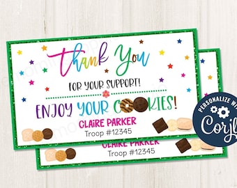 May include: Green and white thank you card with a green glitter border. The card says "Thank You for your support! Enjoy your cookies!" with a girl scout cookie graphic. The card also includes the text "Claire Parker Troop #12345".