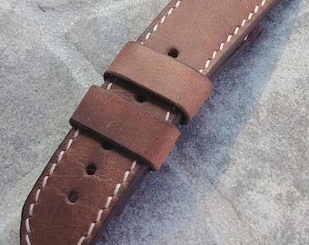 Handgestikte horlogeband van gewaxt Italiaans leer, 26 mm, bruin, met zadelsteek.