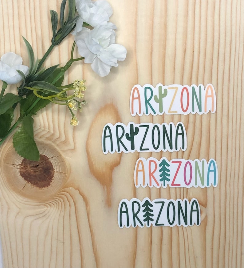 May include: Four stickers with the word "Arizona" in different colors and fonts. Each sticker features a different desert-themed icon: a cactus, a pine tree, and two different cacti.
