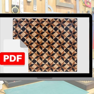 Może przedstawiać: Ekran laptopa wyświetla geometryczny wzór w odcieniach brązu i czerni, przypominający inkrustację drewnianą. Czerwona ikona PDF jest widoczna na ekranie. Tło przedstawia warsztat z narzędziami.