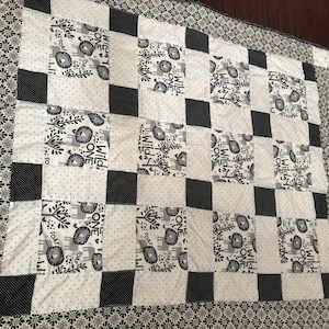 Black and white baby quit