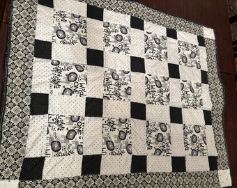 Black and white baby quit