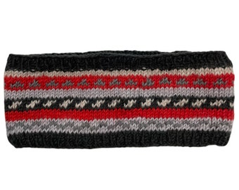 May include: A black, gray, and red knitted headband with a geometric pattern.