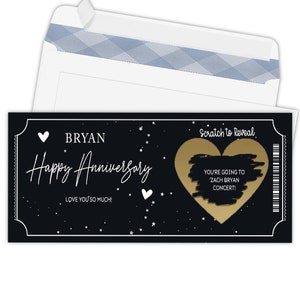 K&ouml;nnte beinhalten: Eine schwarze und goldene Rubbelkarte mit dem Text "BRYAN Happy Anniversary ICH LIEBE DICH SO SEHR!" und einem goldenen Herzen mit dem Text "Rubbeln zum Aufdecken DU GEHST ZU EINEM ZACH BRYAN KONZERT!"